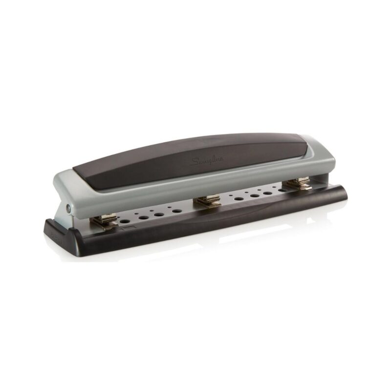Swingline desktop hole punch in black and silver on desk