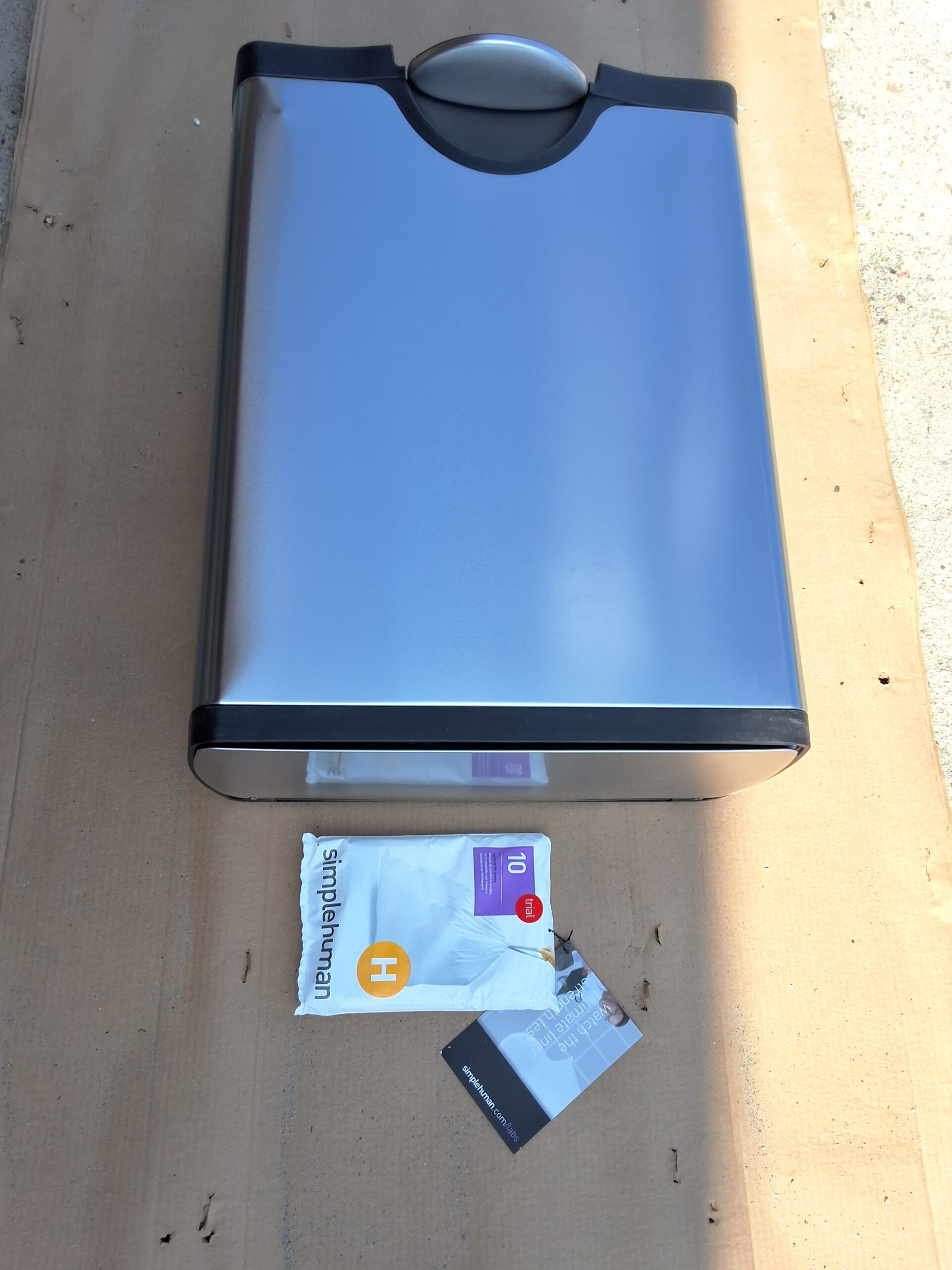 Simplehuman stainless steel trash can in brushed rectangular dual compartment design