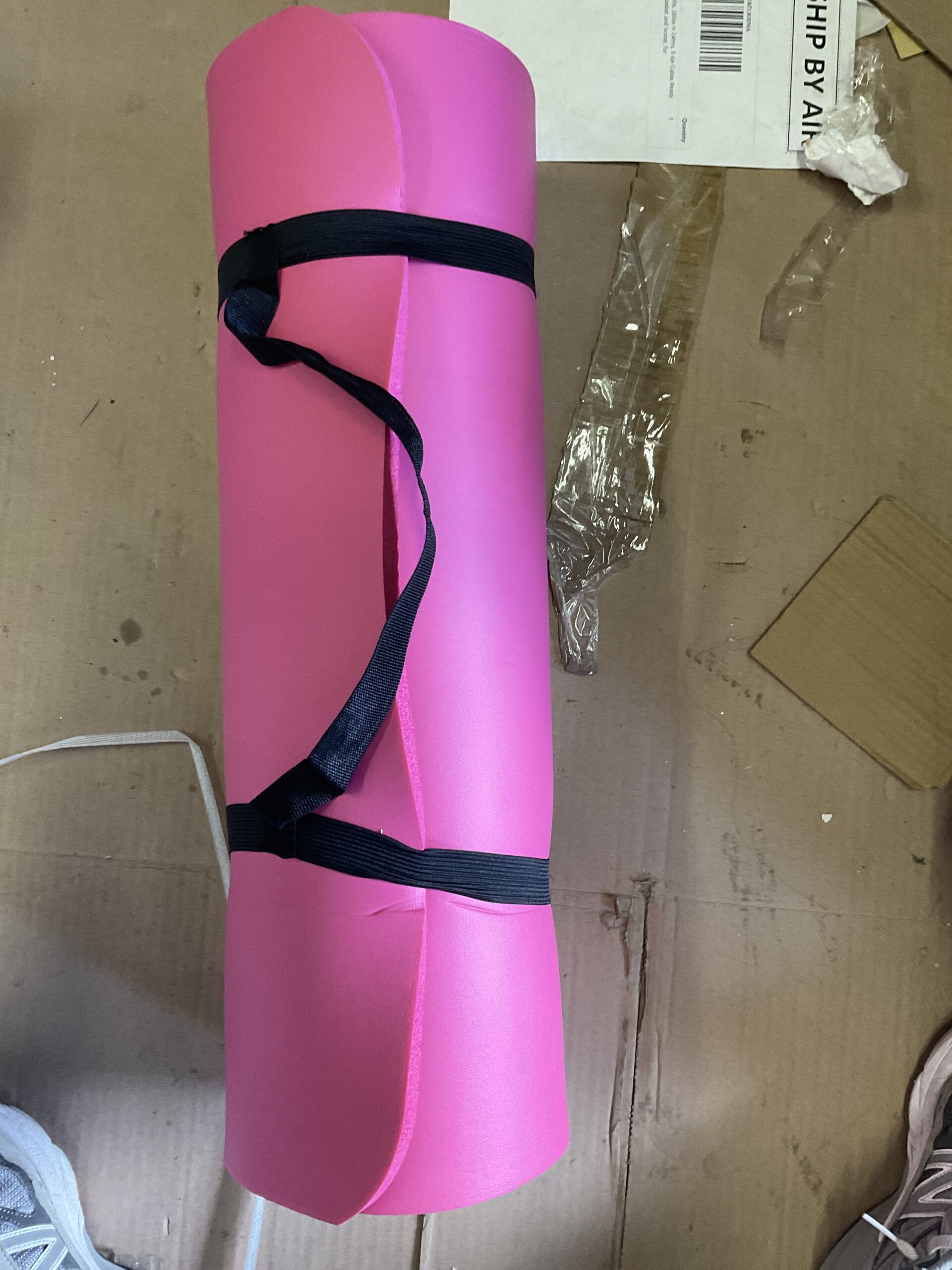 Amazon Basics extra thick exercise yoga mat in pink with carrying strap