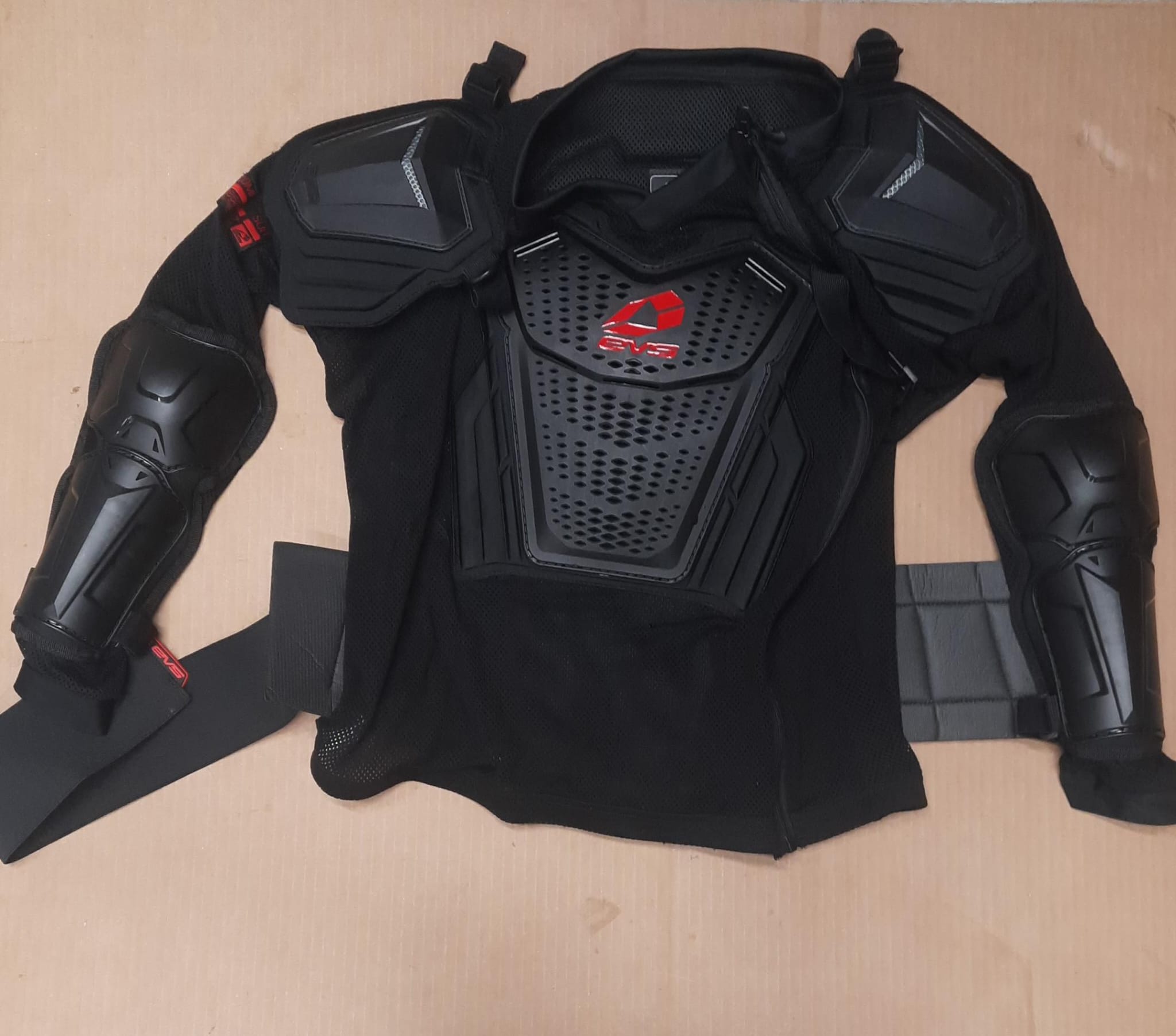 Evs sports comp suit in black and red professional product photography