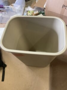 Winco square plastic trash can in beige for commercial use
