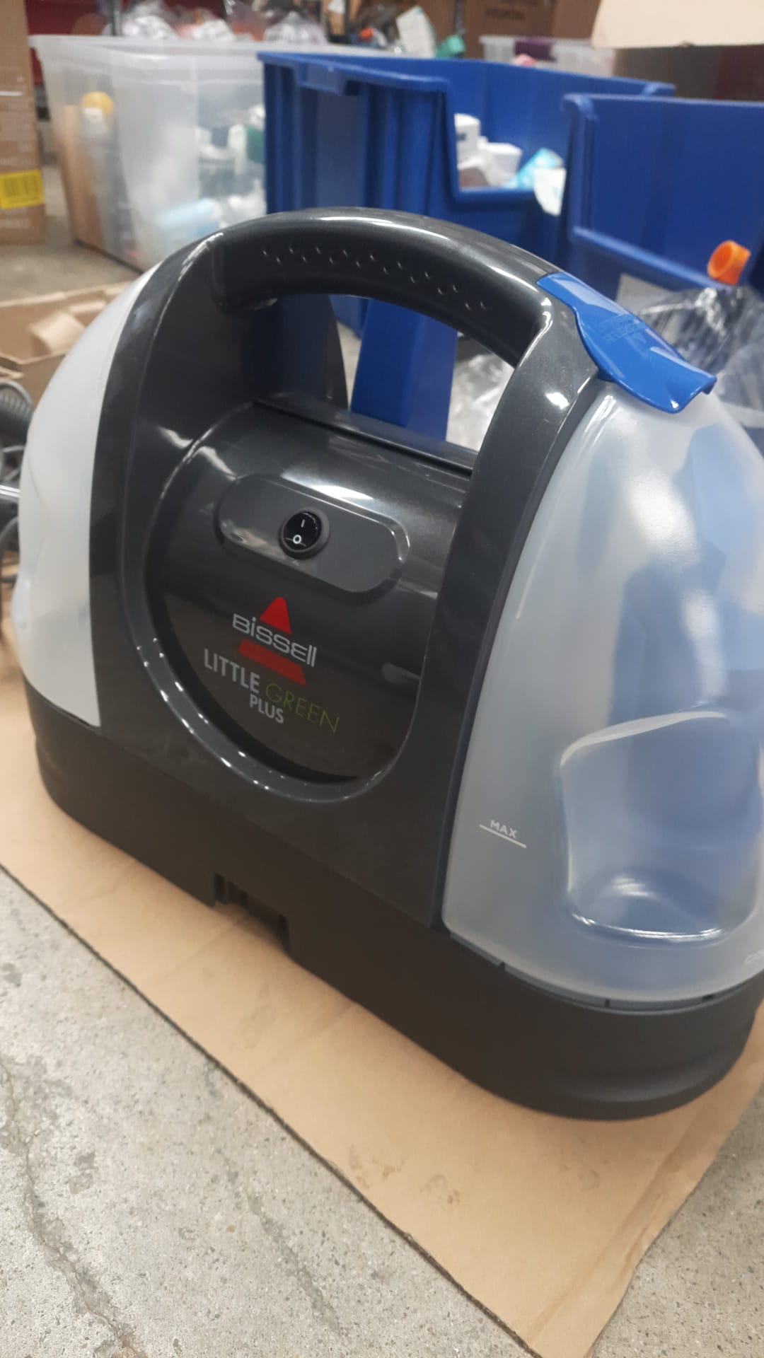 Bissell portable carpet cleaner in green and black compact design