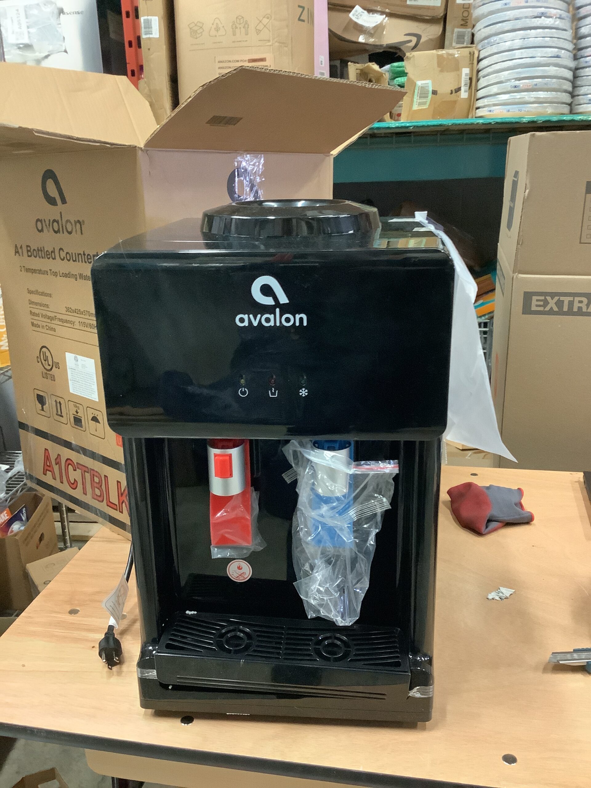 Avalon countertop water cooler dispenser in black with child safety lock