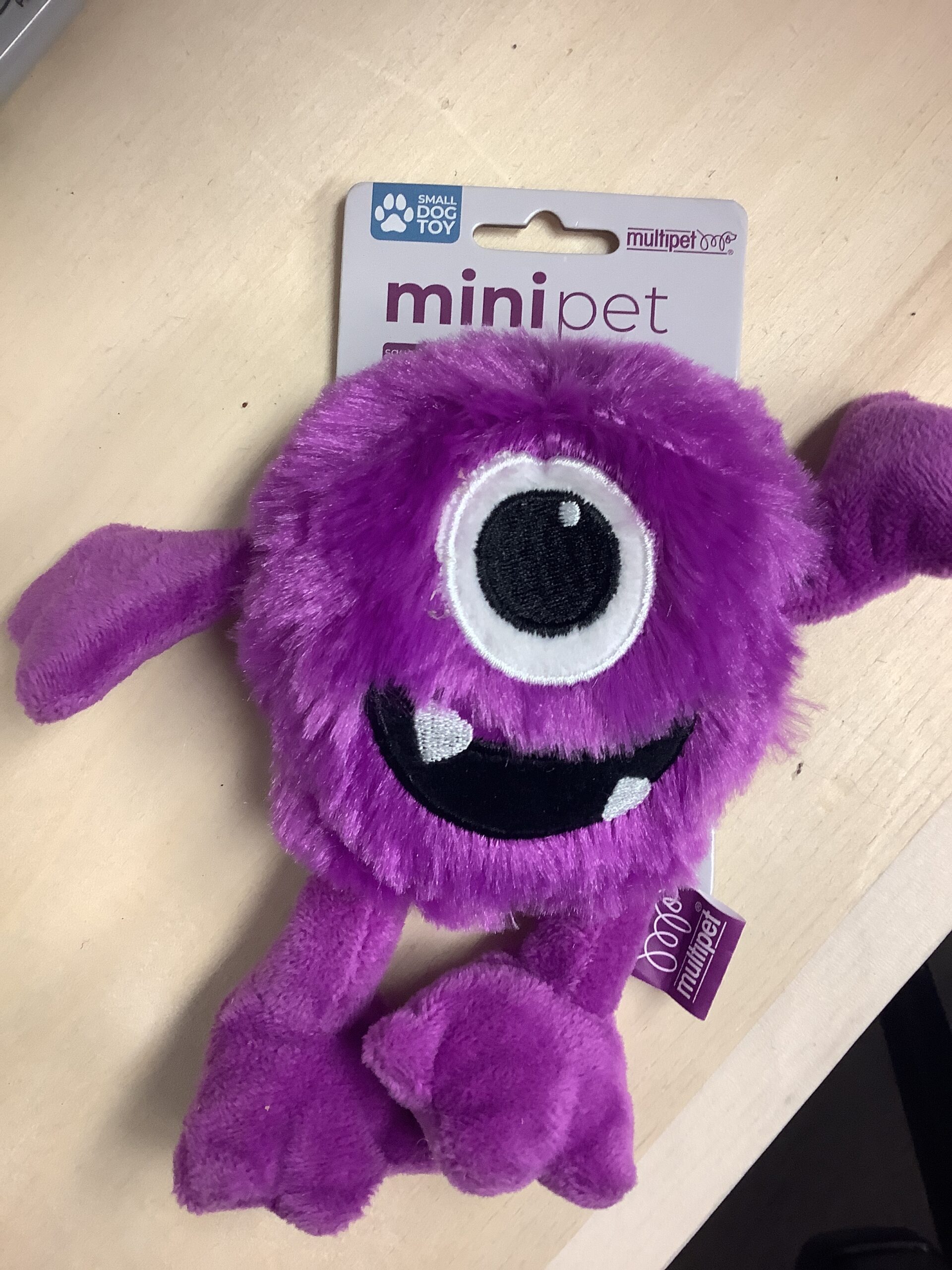 Multipet purple monster dog toy in vibrant purple plush fabric