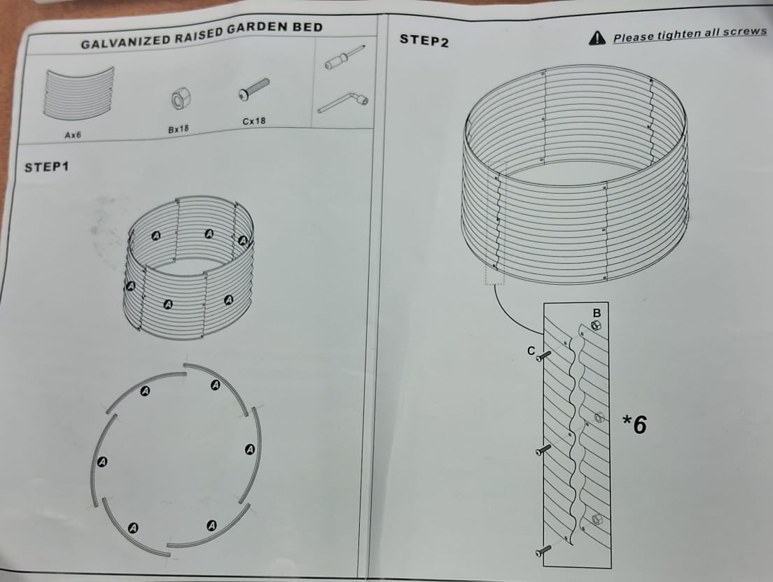 Round galvanized raised garden bed in silver with tool-free assembly