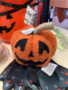 Bullseye's Playground™ fuzzy pumpkin decor in bright orange with smiley face