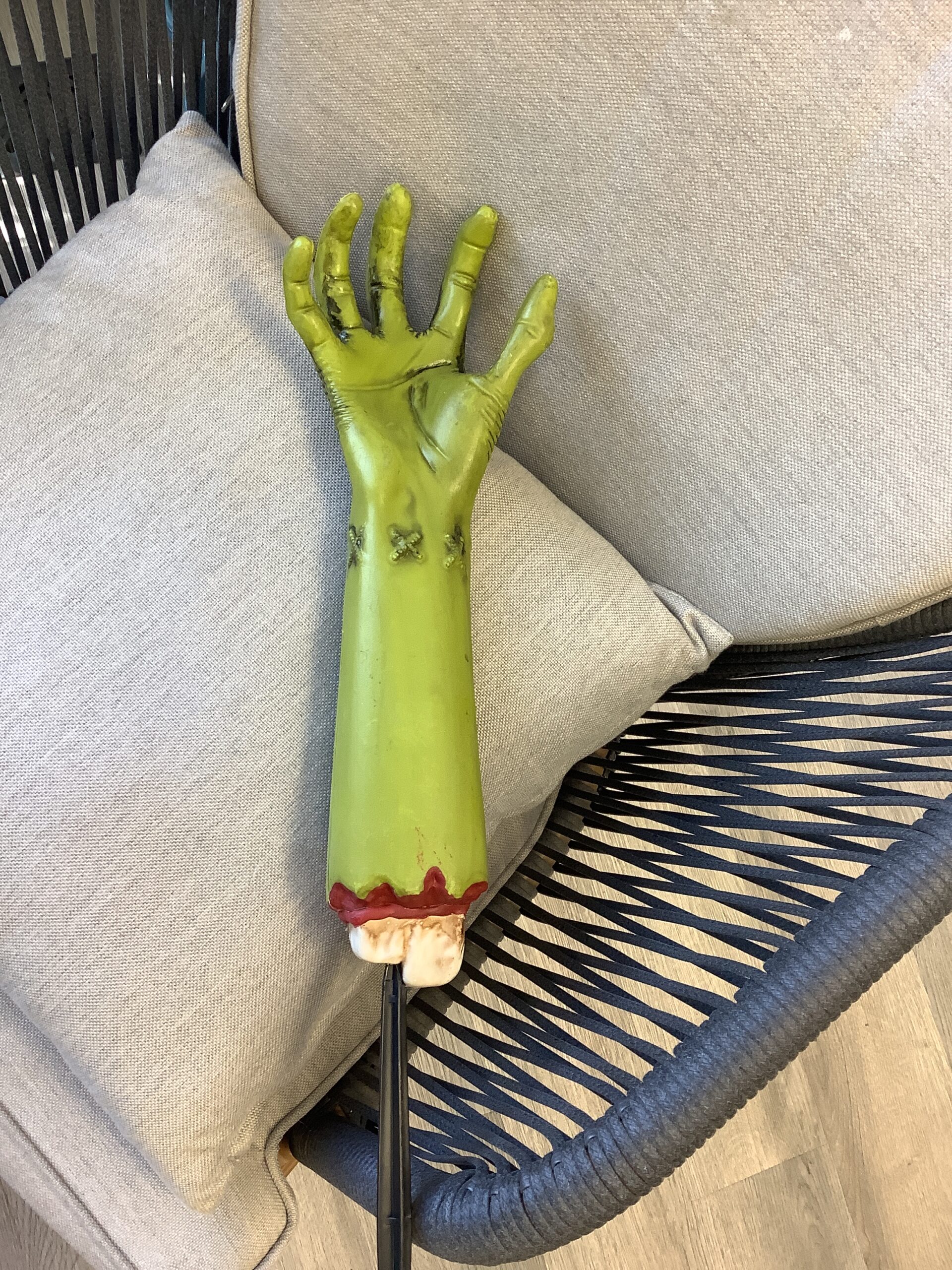 Hyde And Eek! zombie hand decoration in realistic spooky style