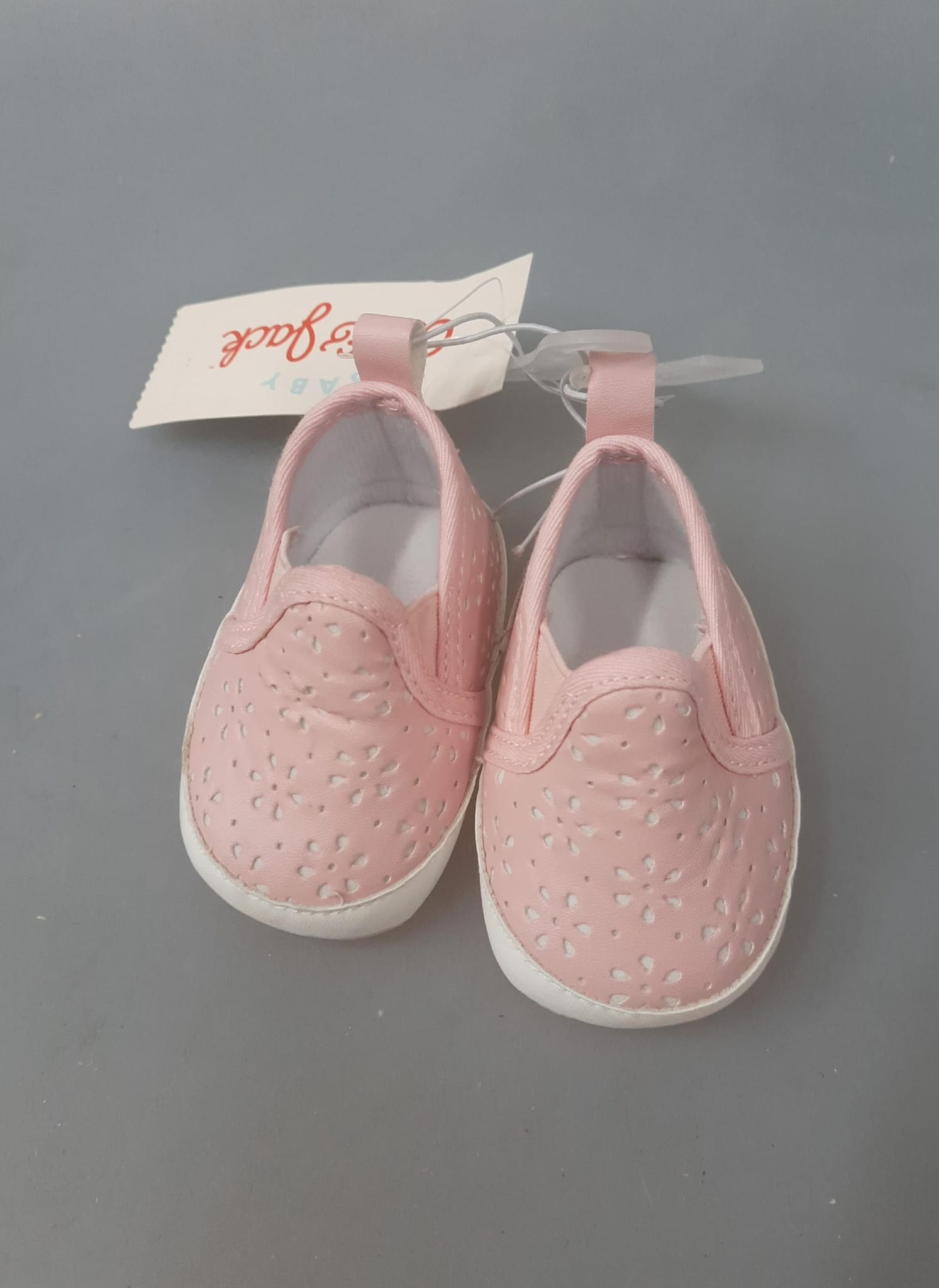 Cat Jack baby girls slip-on sneakers in pink with eyelet design