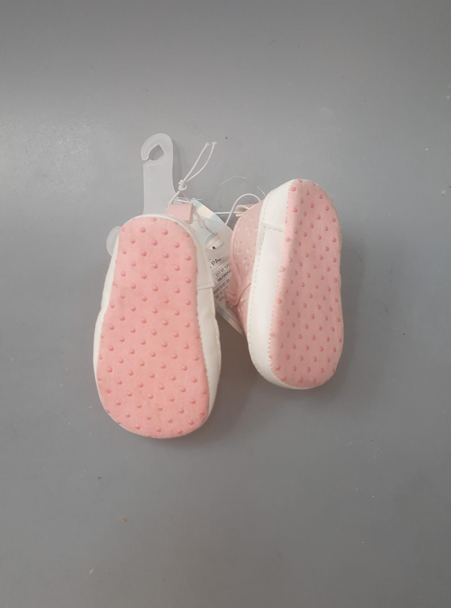 Cat Jack baby girls slip-on sneakers in pink with eyelet design