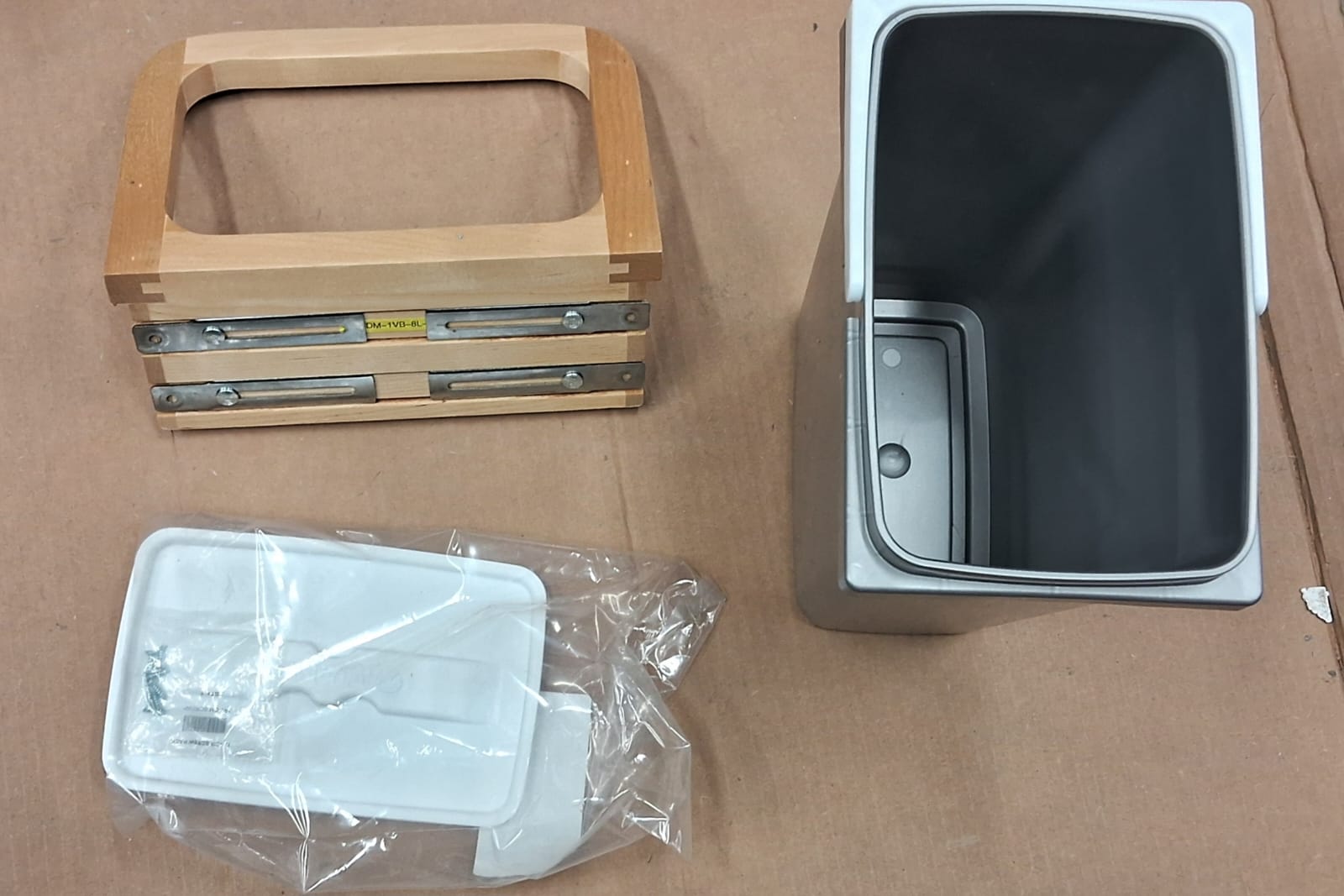 Rev-A-Shelf vanity door mount waste container in gray finish