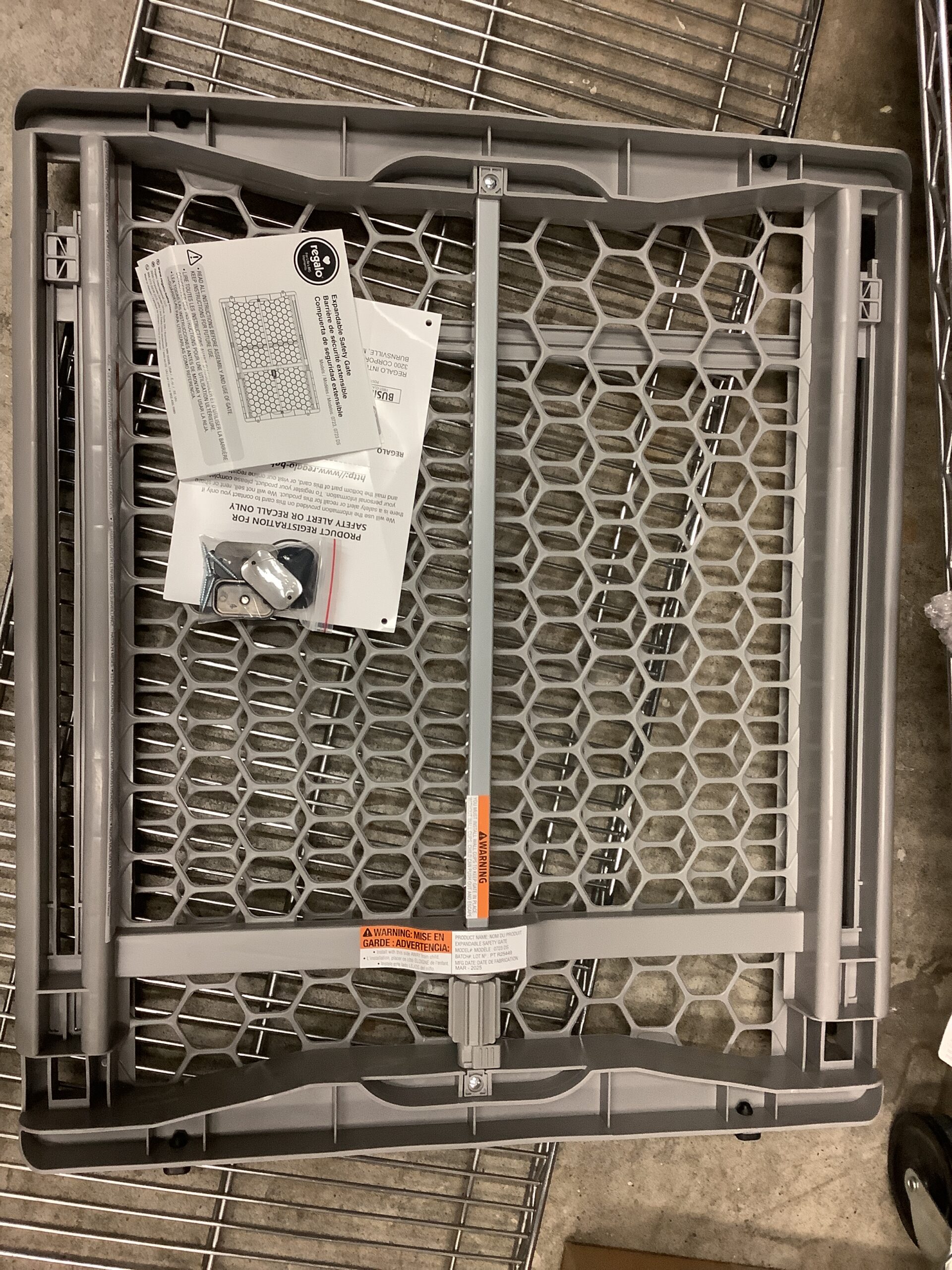 Regalo extra wide baby gate in white plastic pressure-mounted design