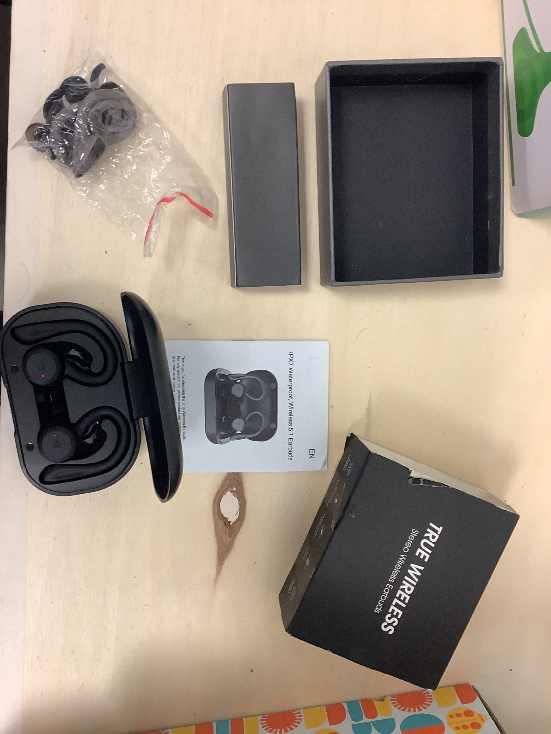 Muzili true wireless earbuds in black with charging case