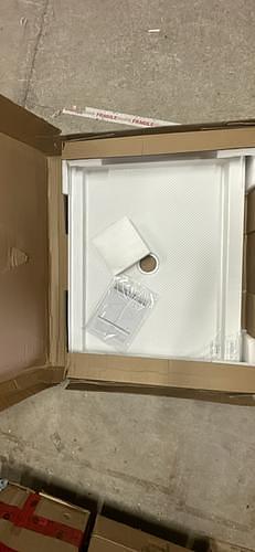 Slimline acrylic alcove shower base in white with slip-resistant surface