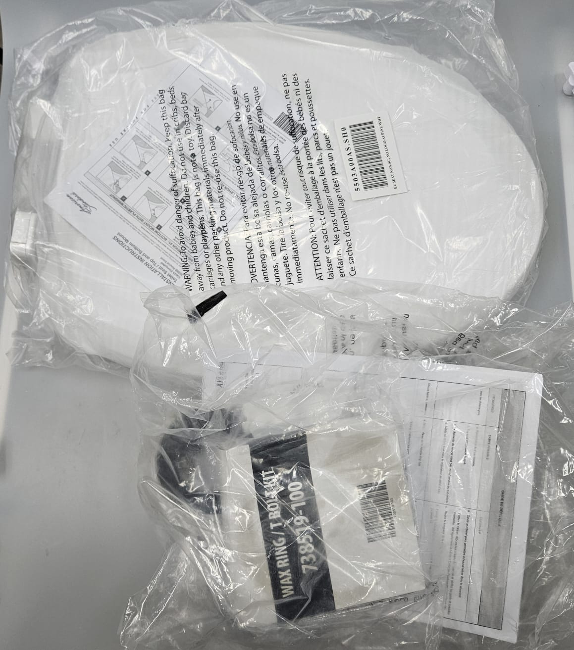 American Standard elongated slow close toilet seat in white finish