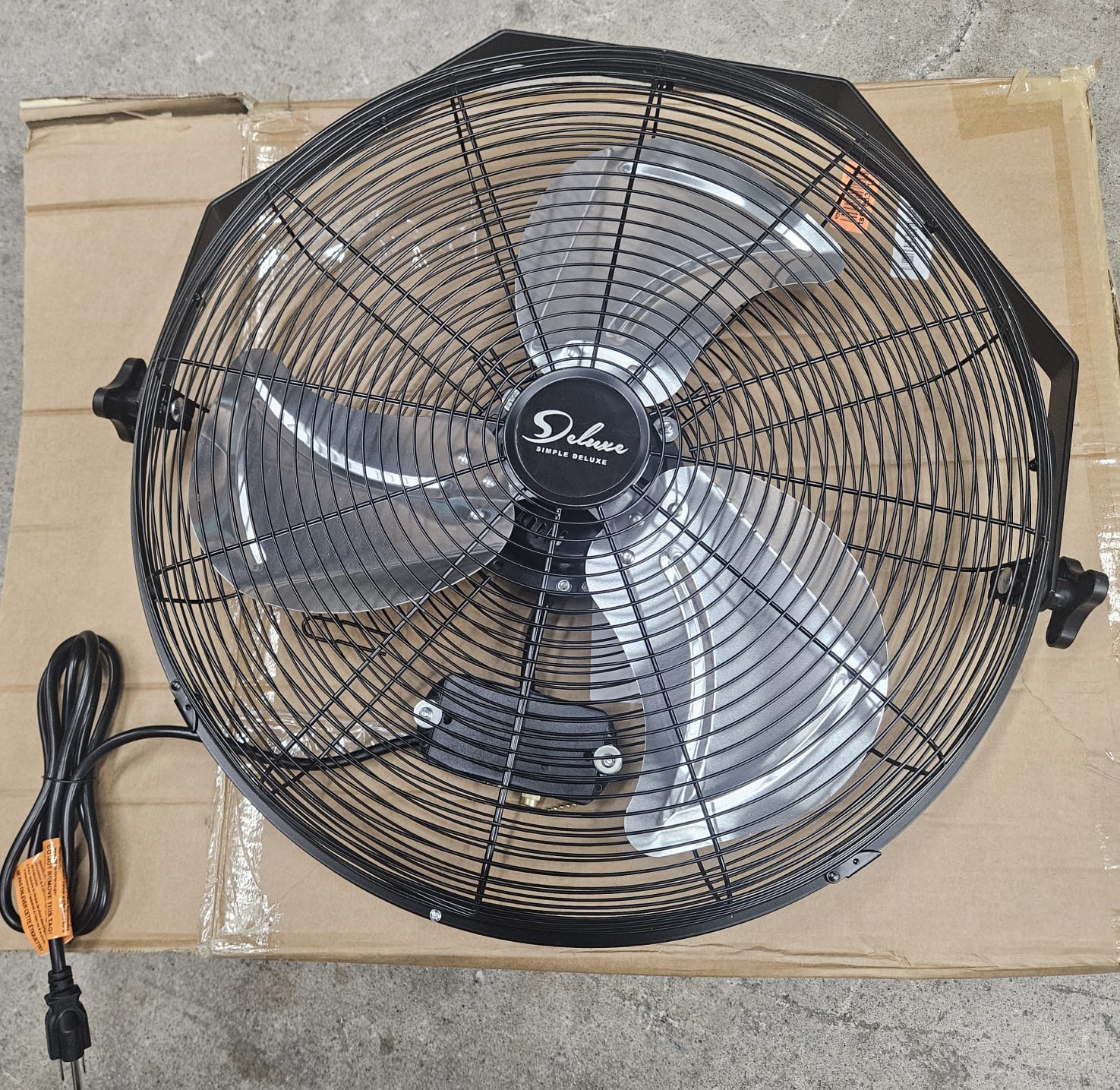 Simple high velocity wall fan in black metal finish