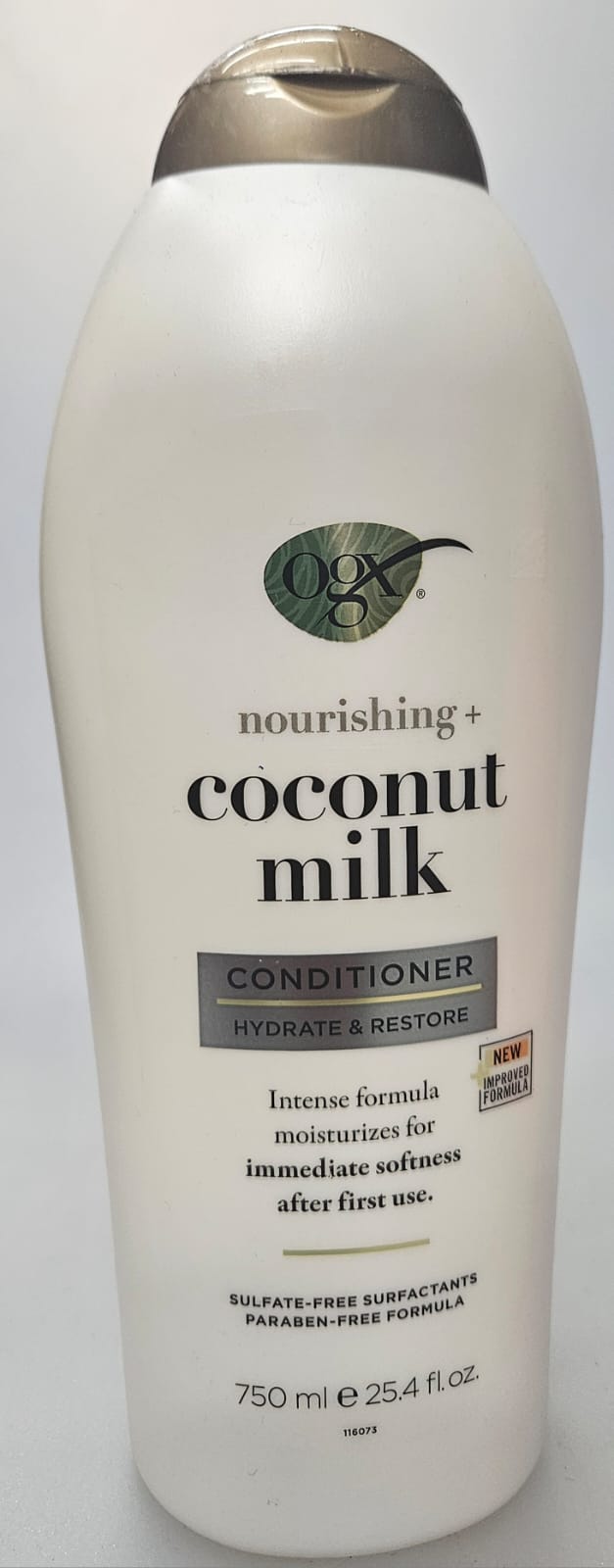 OGX nourishing conditioner in coconut milk formula bottle