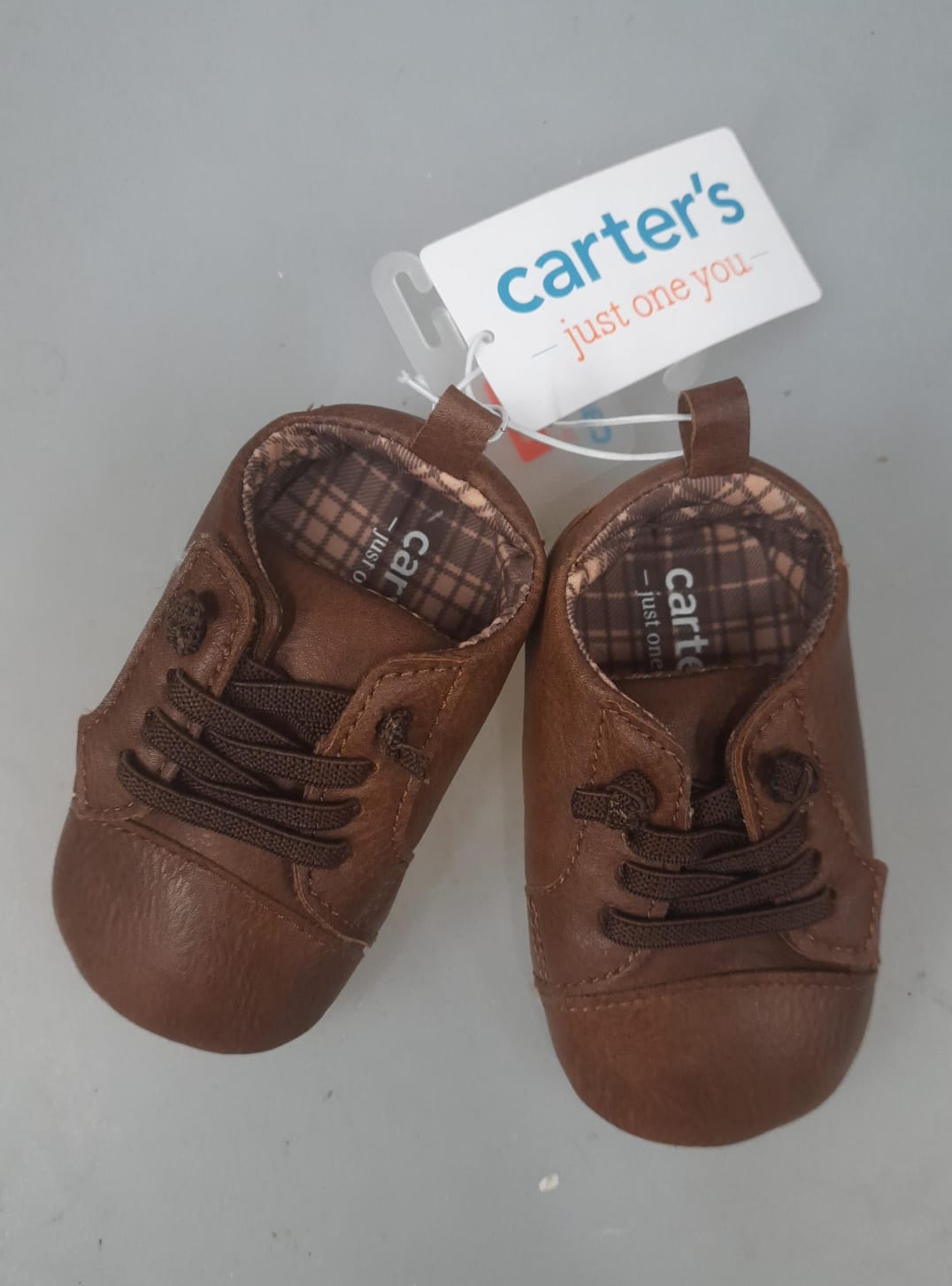 Carter’s baby boy sneakers in brown for 6-12 months
