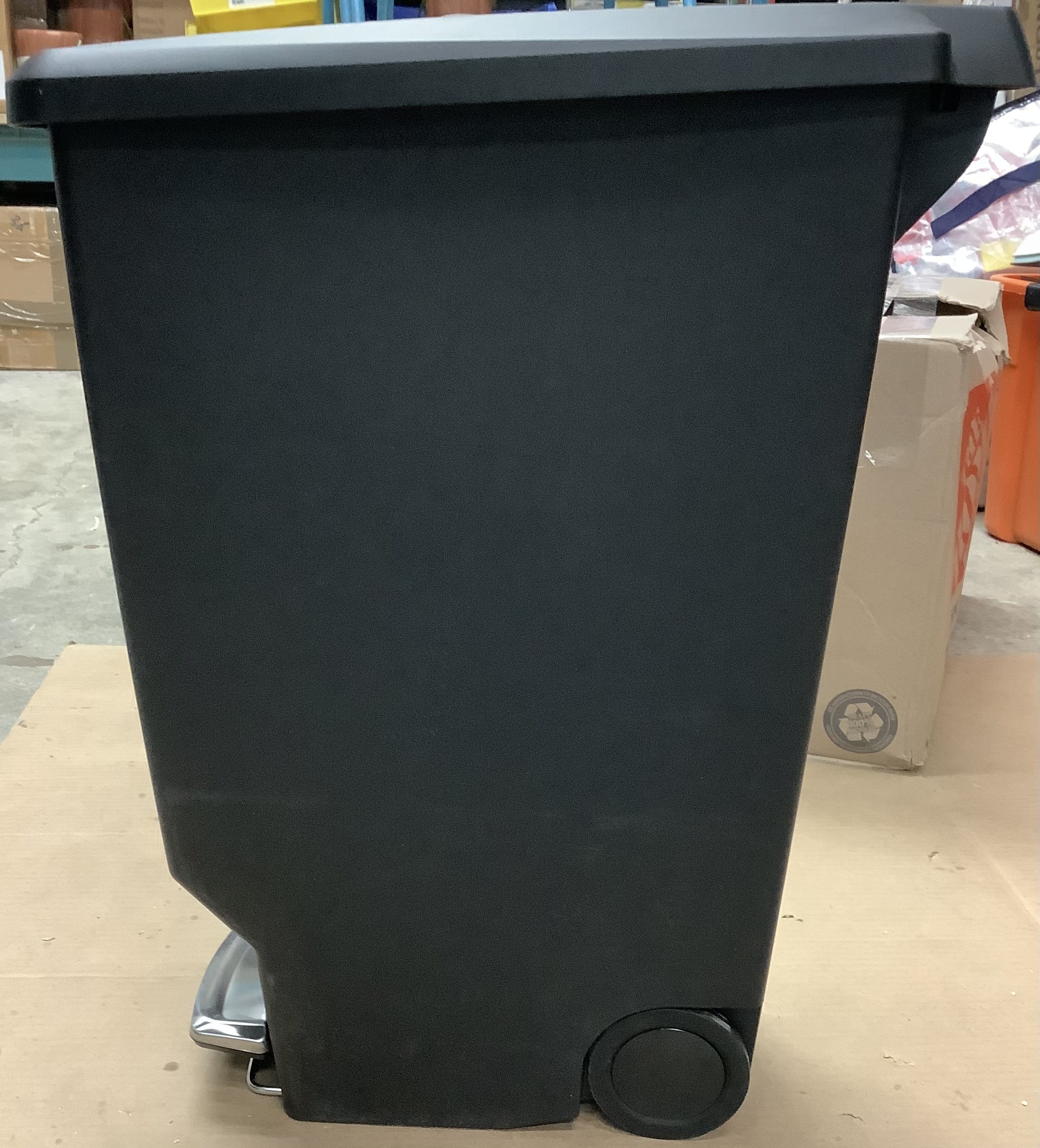 simplehuman slim kitchen step trash can in black with secure slide lock