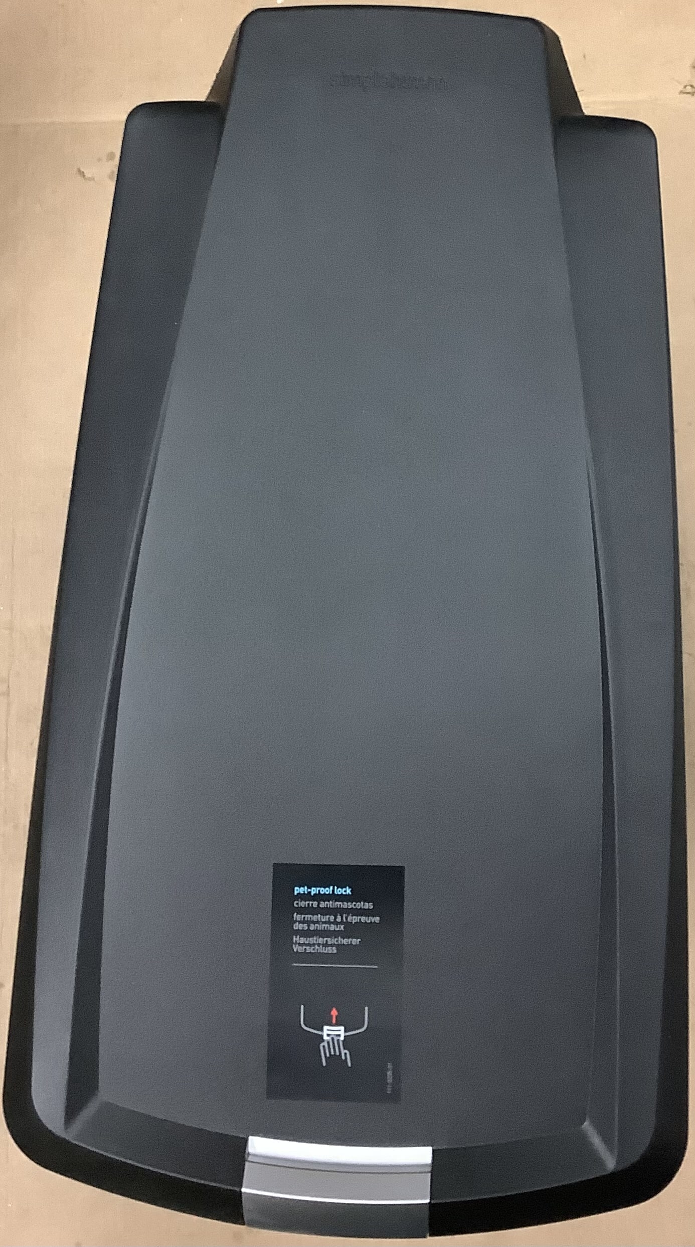 simplehuman slim kitchen step trash can in black with secure slide lock