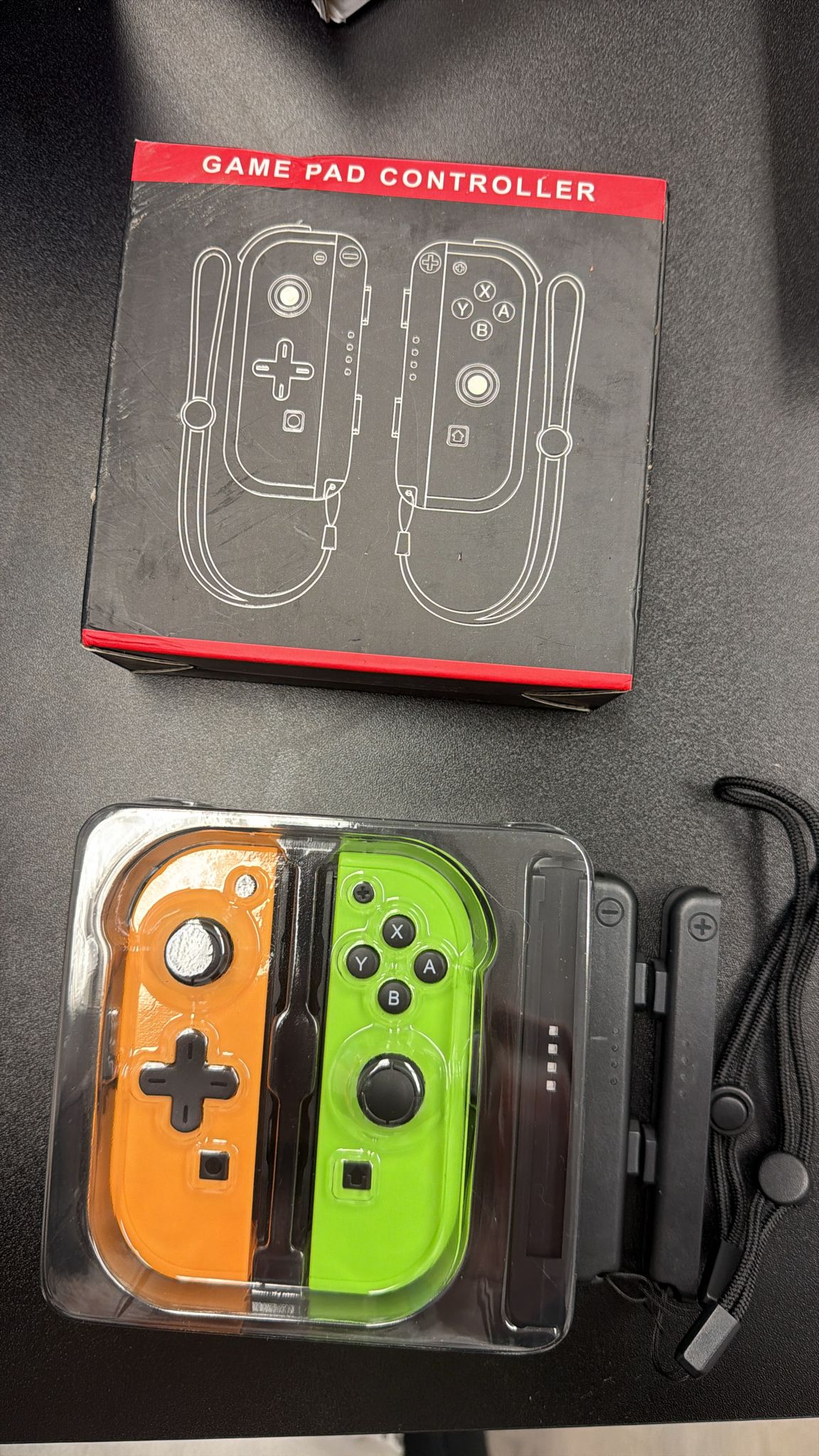 Nintendo joypad controller replacement in yellow and green with strap