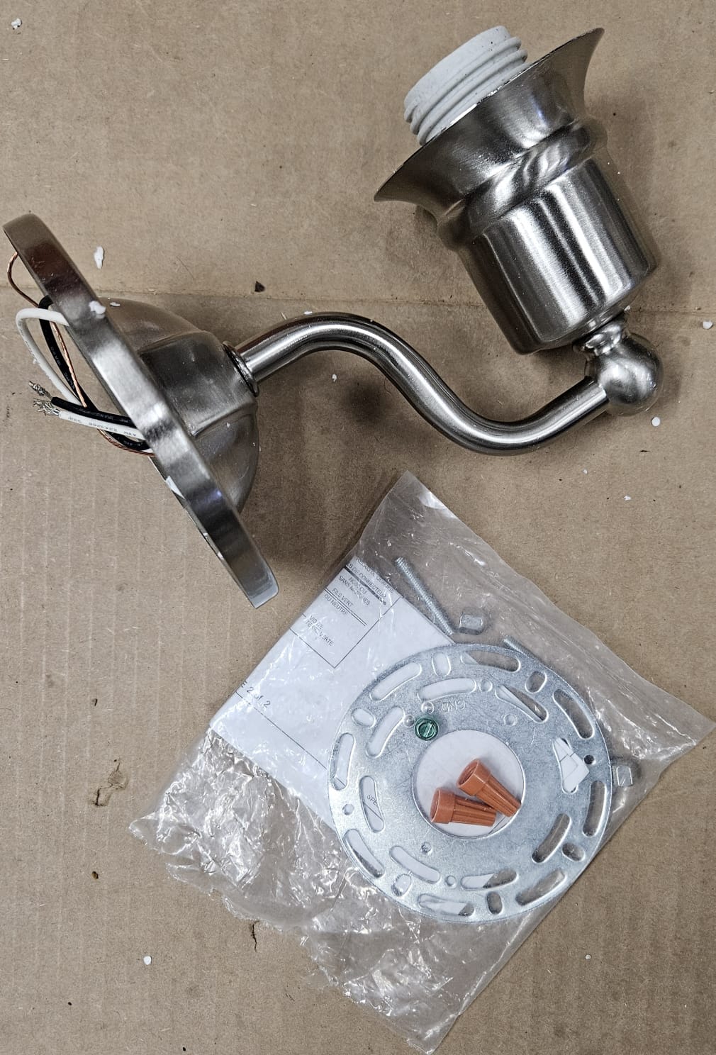 Progress Lighting wall bracket in brushed nickel with white etched glass