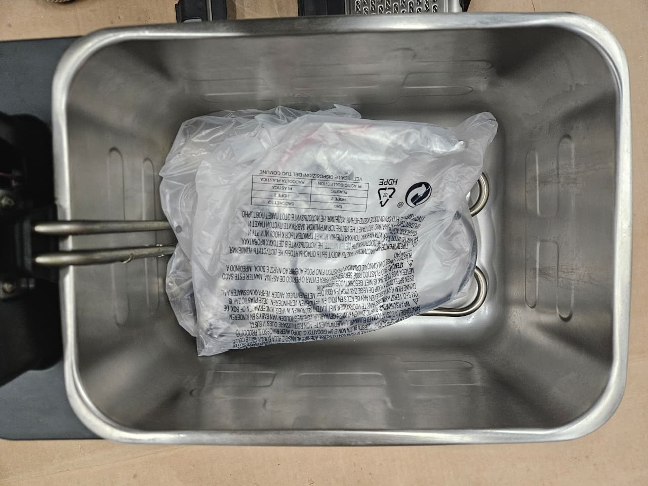 T-FAL deep fryer in use, featuring ultimate EZ clean design