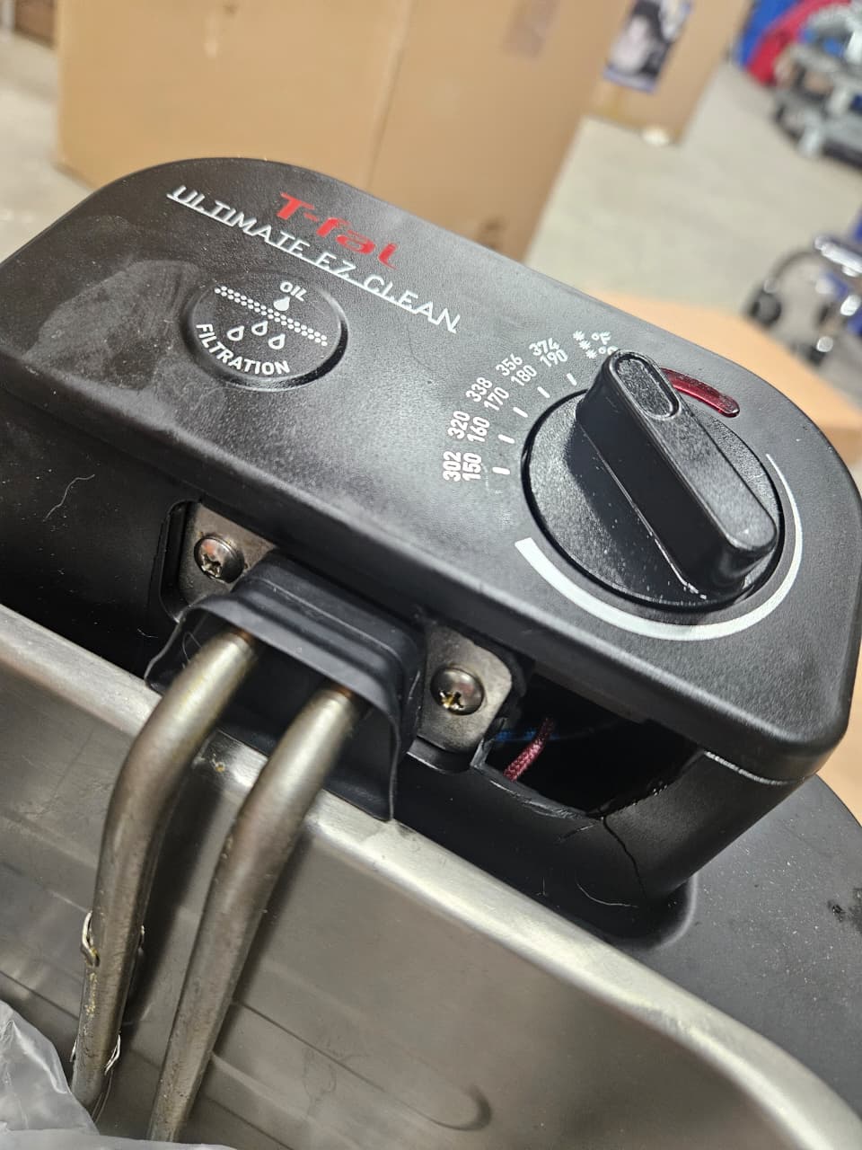 T-FAL deep fryer in use, featuring ultimate EZ clean design