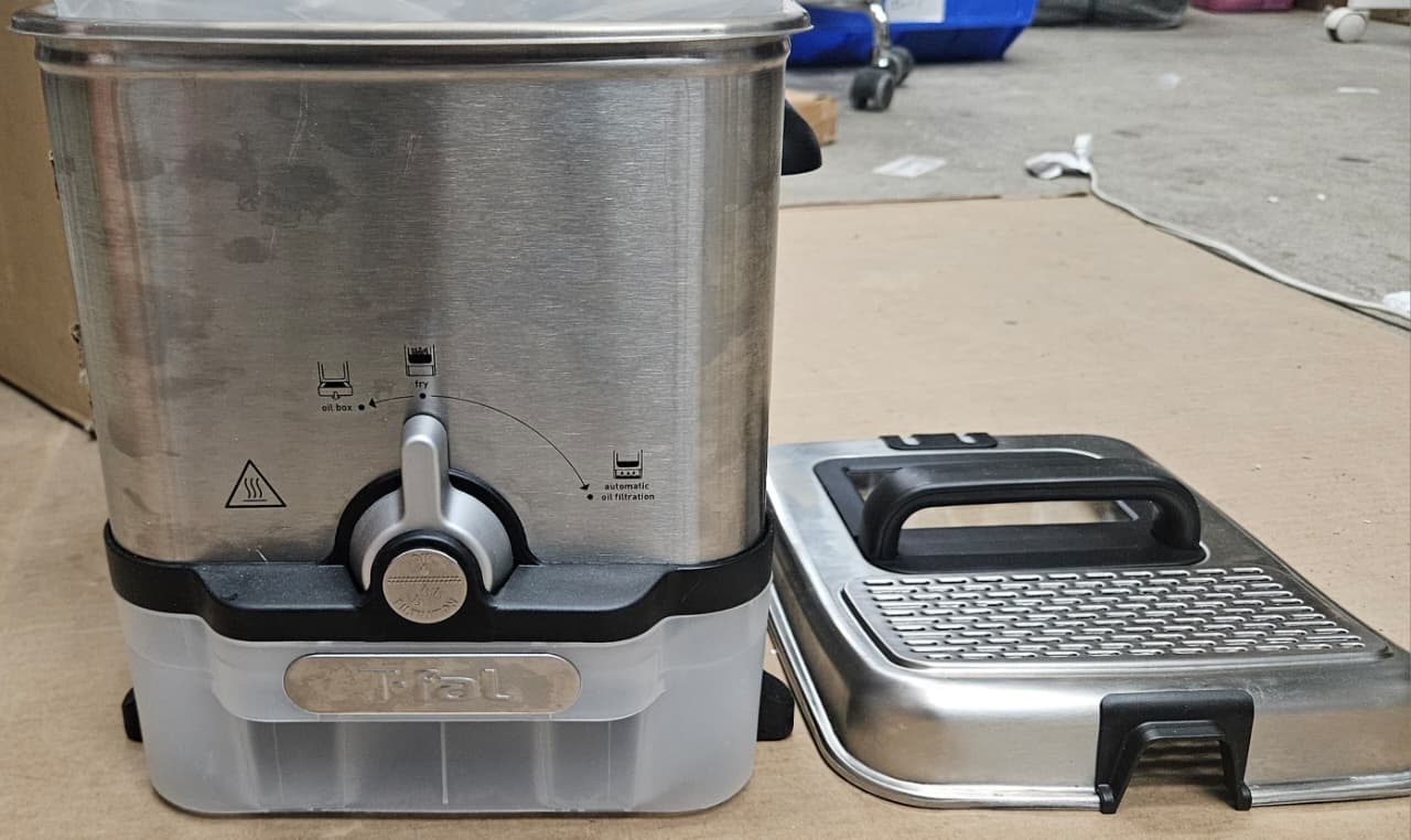 T-FAL deep fryer in use, featuring ultimate EZ clean design