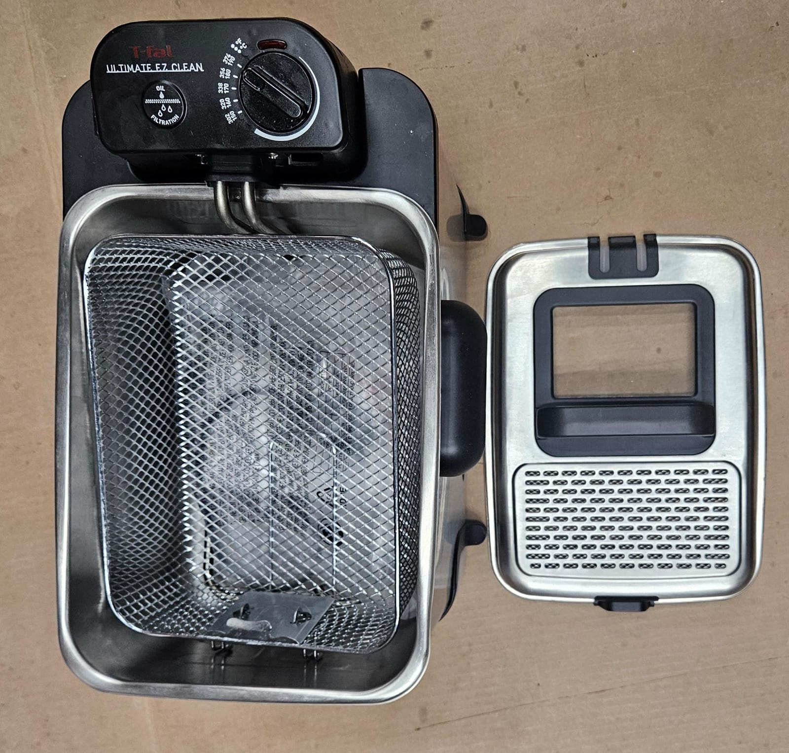 T-FAL deep fryer in use, featuring ultimate EZ clean design