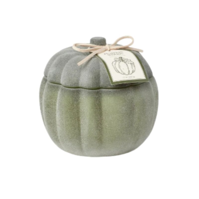 Pumpkin Woods Scented Candle 12 oz creating a warm atmosphere