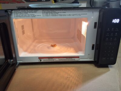 Chefman Countertop Microwave Oven 0.7 Cu. Ft. in black, perfect for your kitchen