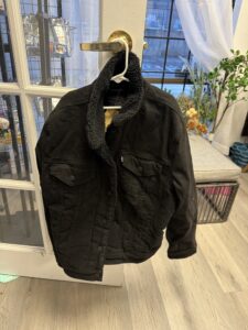 Levi's Women's Original Sherpa Trucker Jacket in black, warm and stylish