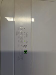 Midea 4500 Sq Ft WiFi enabled dehumidifier with reusable air filter in white