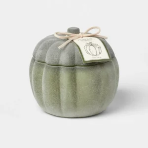 Pumpkin Woods Scented Candle 12 oz creating a warm atmosphere