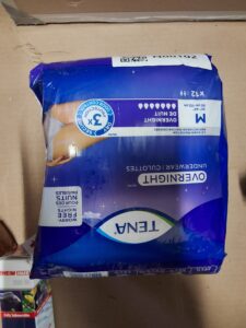 TENA Incontinence Underwear medium size with overnight absorbency in white