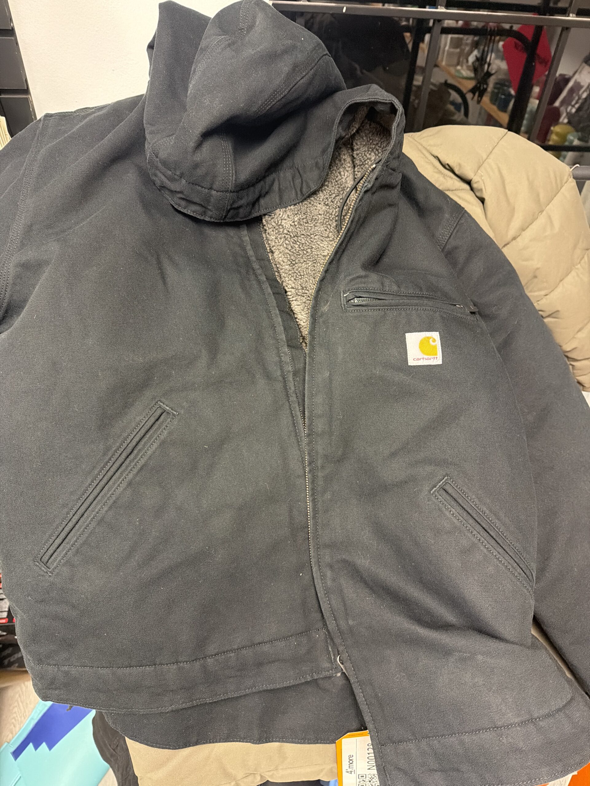 Carhartt sherpa lined utility jacket in black, relaxed fit