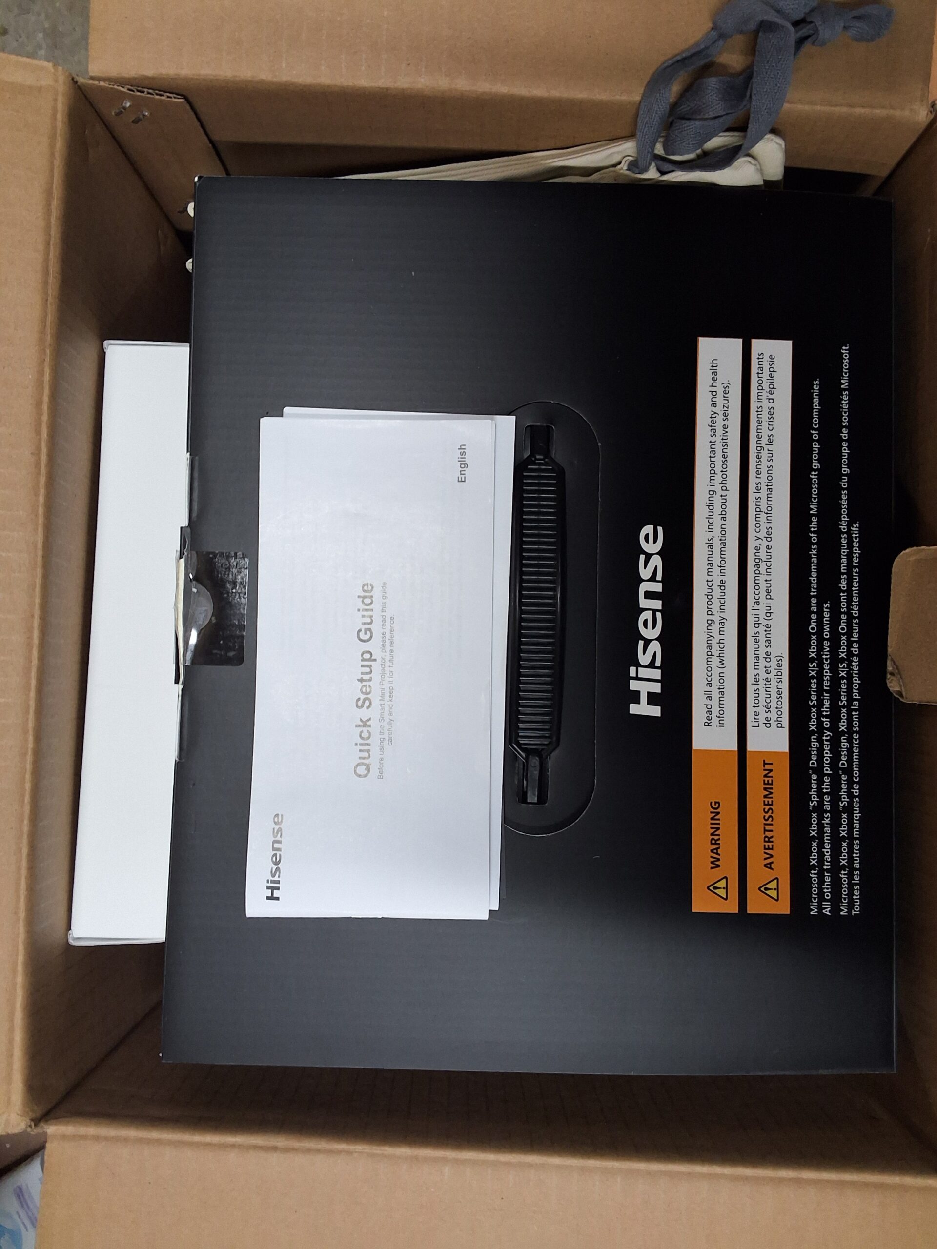 Hisense 4k uhd smart mini projector showing vibrant projection