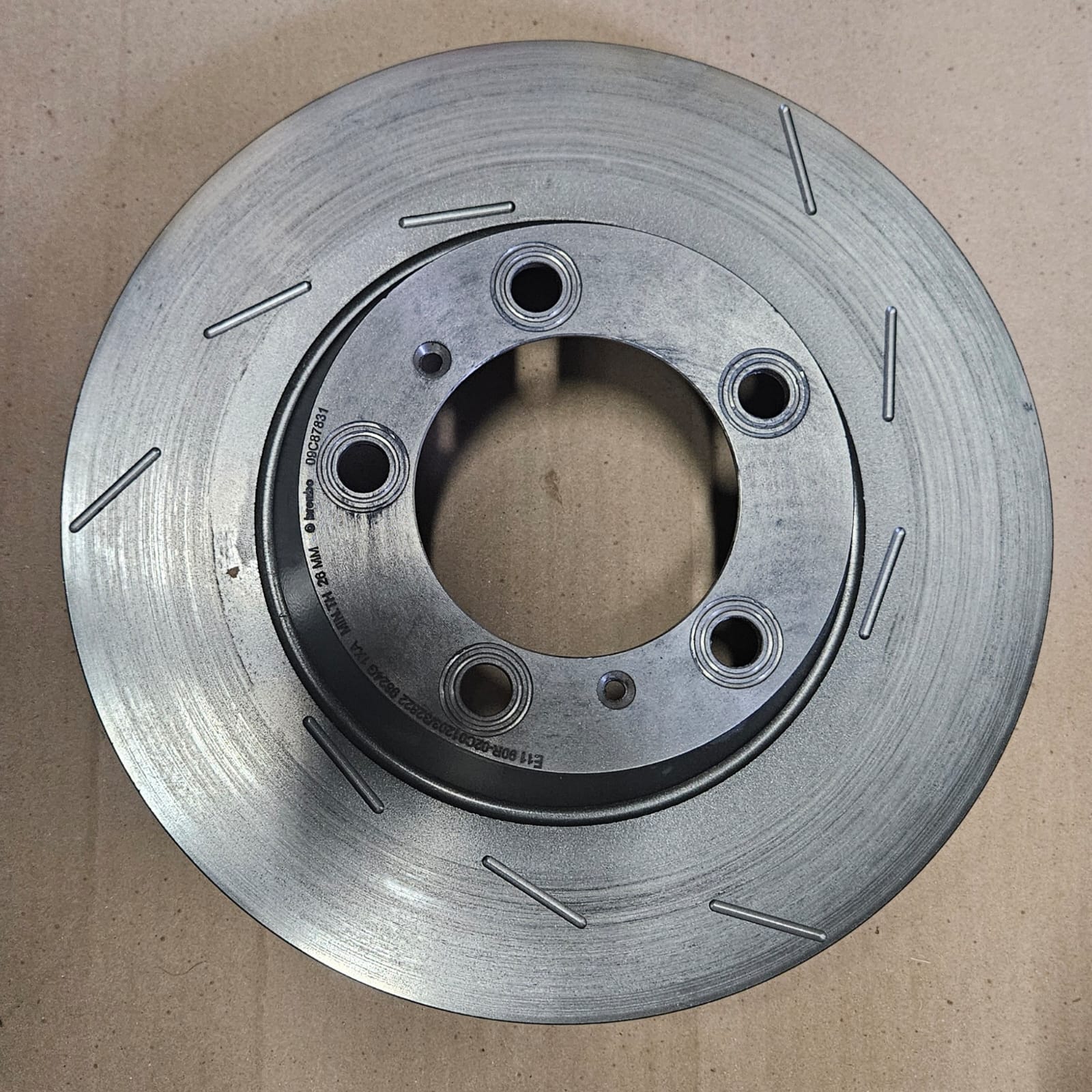 Brembo disc brake rotor in machined cast iron finish