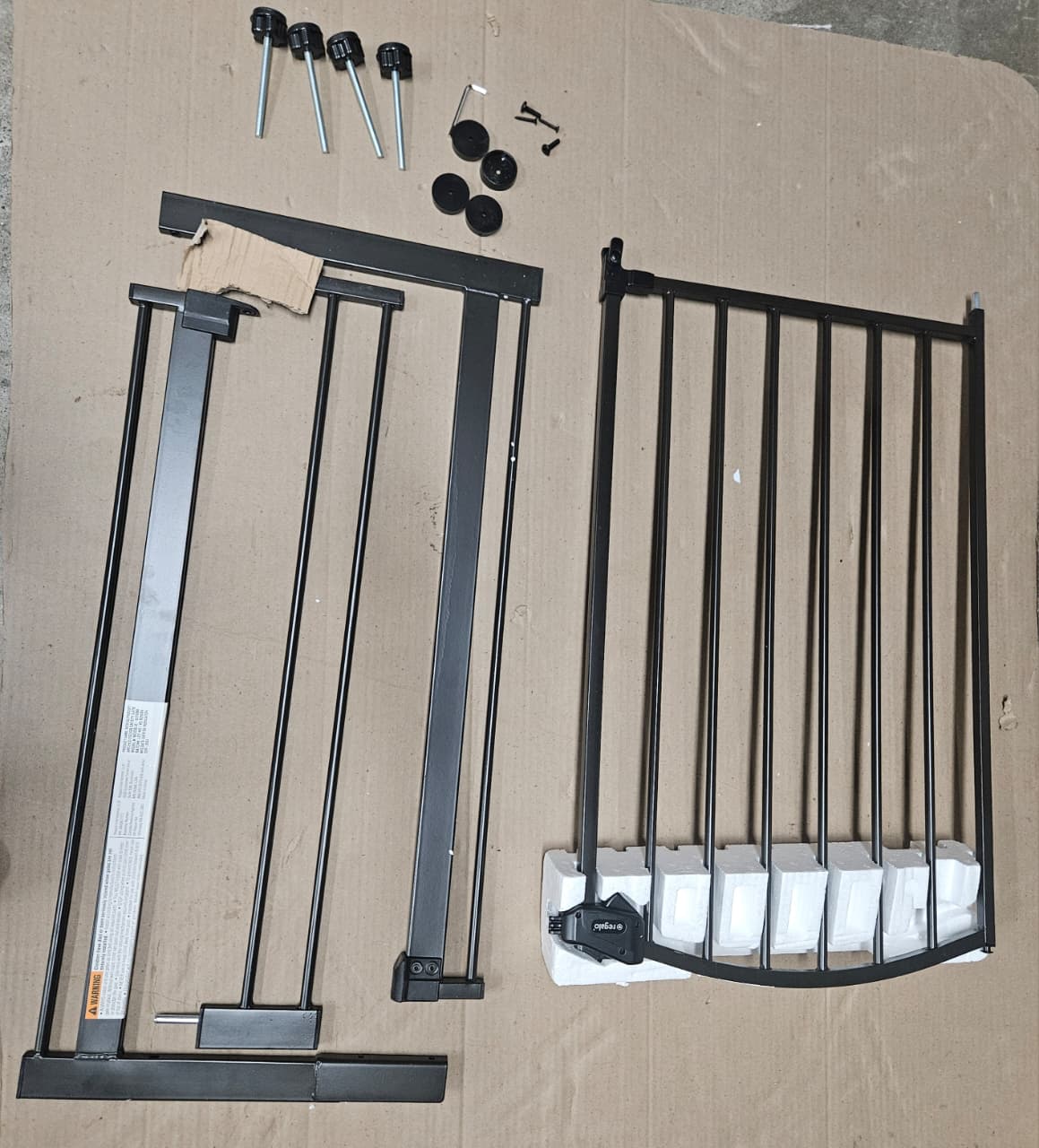 Regalo arched safety gate in bronze finish with easy step design