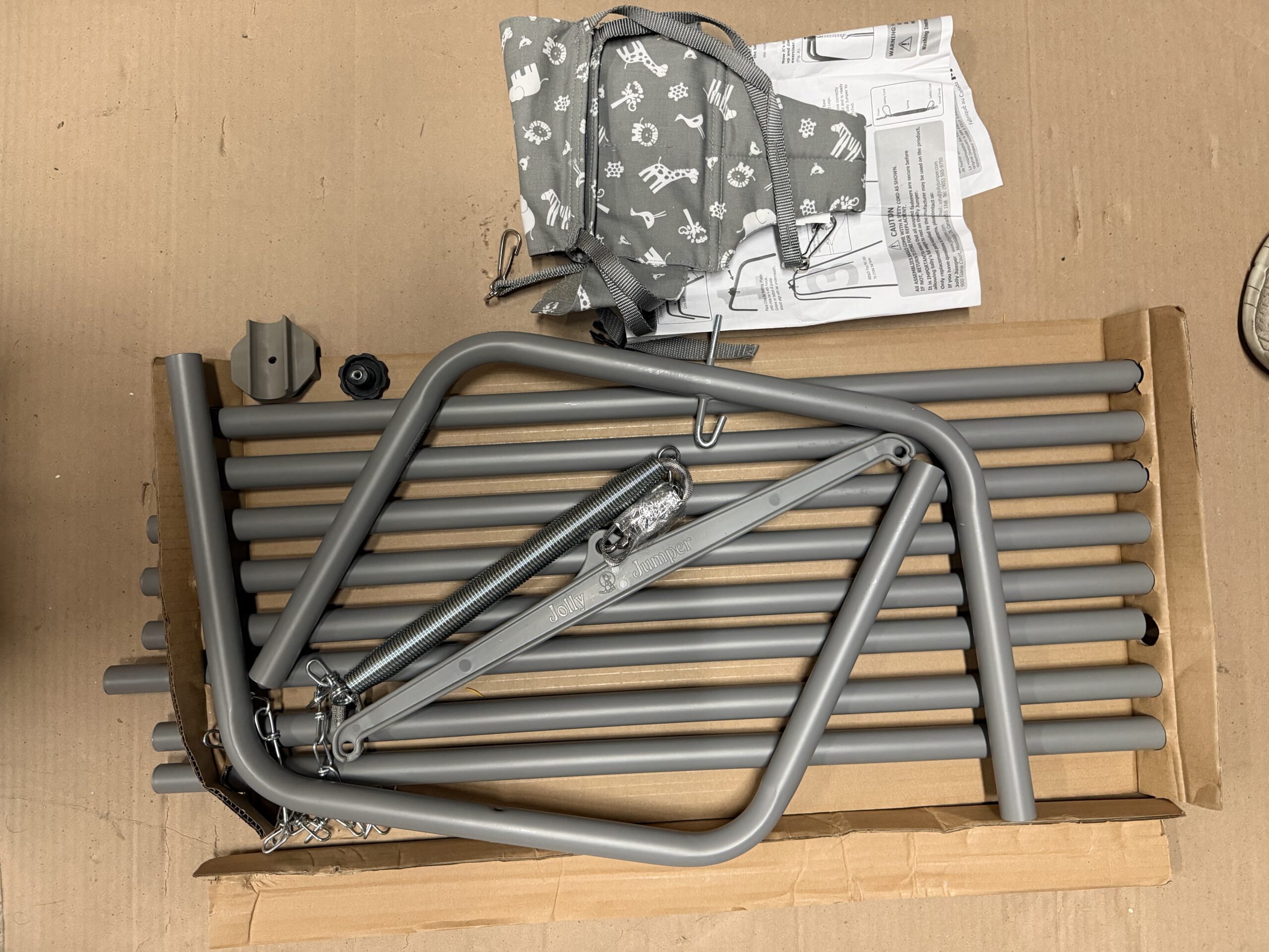 Jolly Jumper baby exerciser in grey safari with sturdy frame and adjustable height