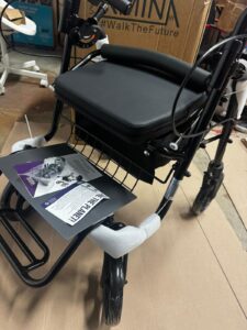 KMINA folding rollator walker in black with adjustable seat and walking aid