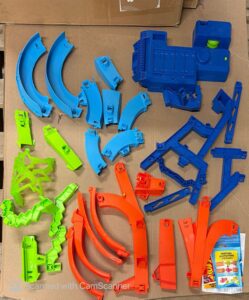 Hot Wheels toy car track set with motorized booster and stunt features