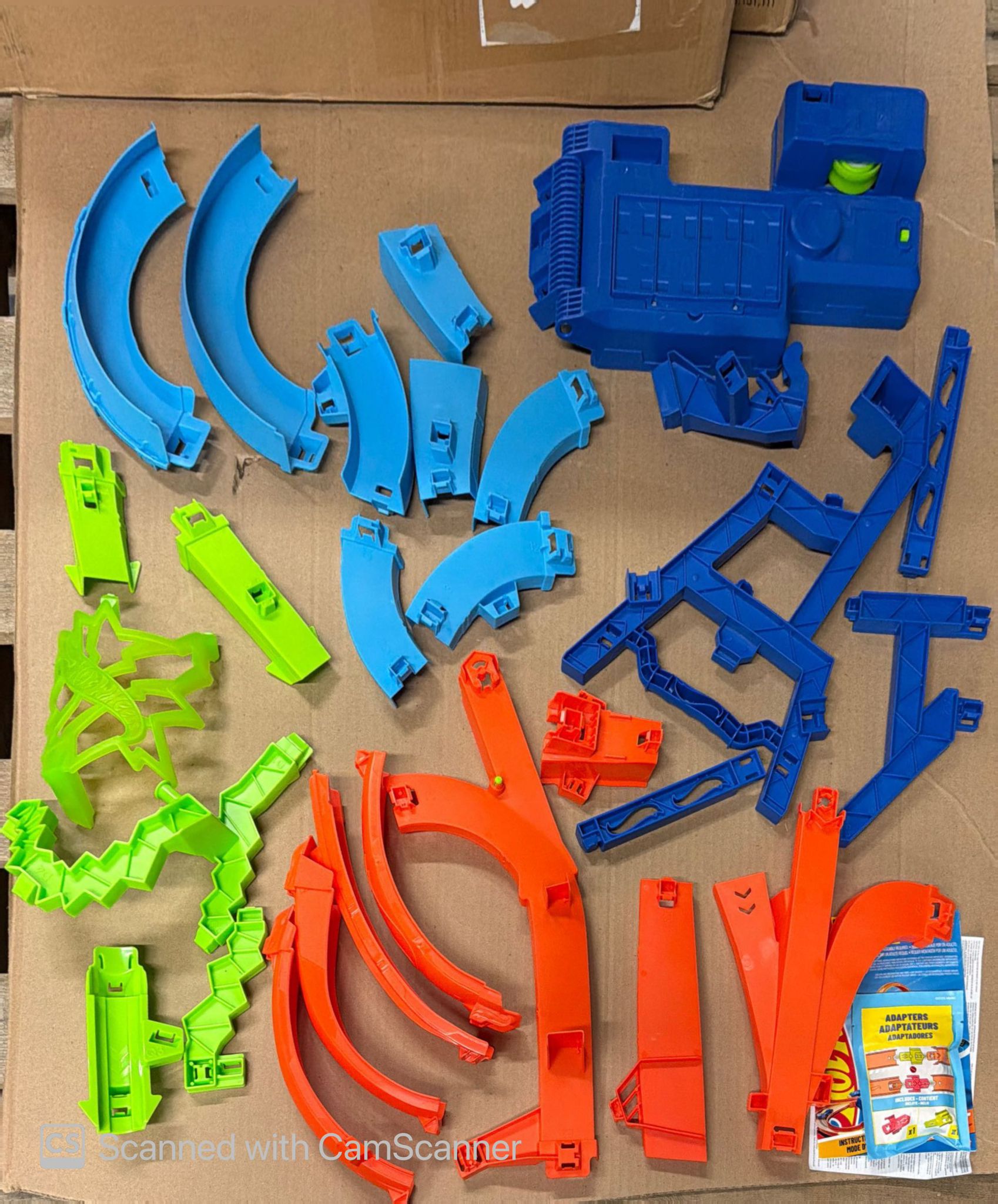 Hot Wheels toy car track set with motorized booster and stunt features