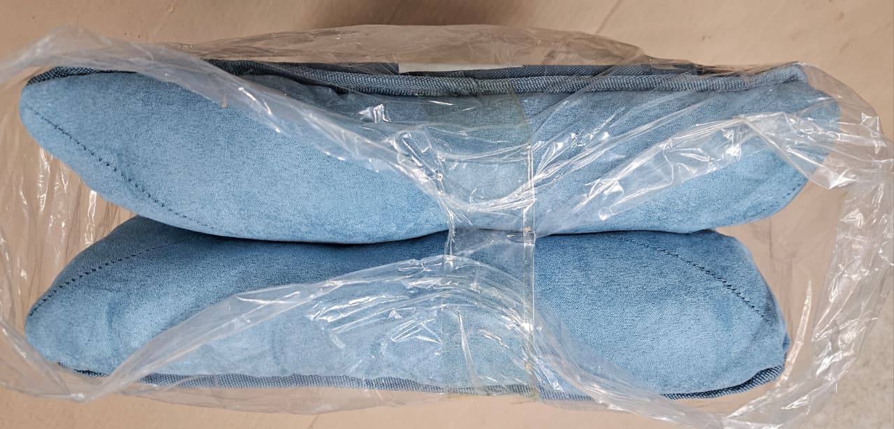 Generic foldable ottoman foot rest in blue for living room and bedroom use