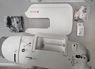 SINGER computerized sewing machine in sleek design with extension table