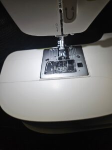 SINGER computerized sewing machine in sleek design with extension table