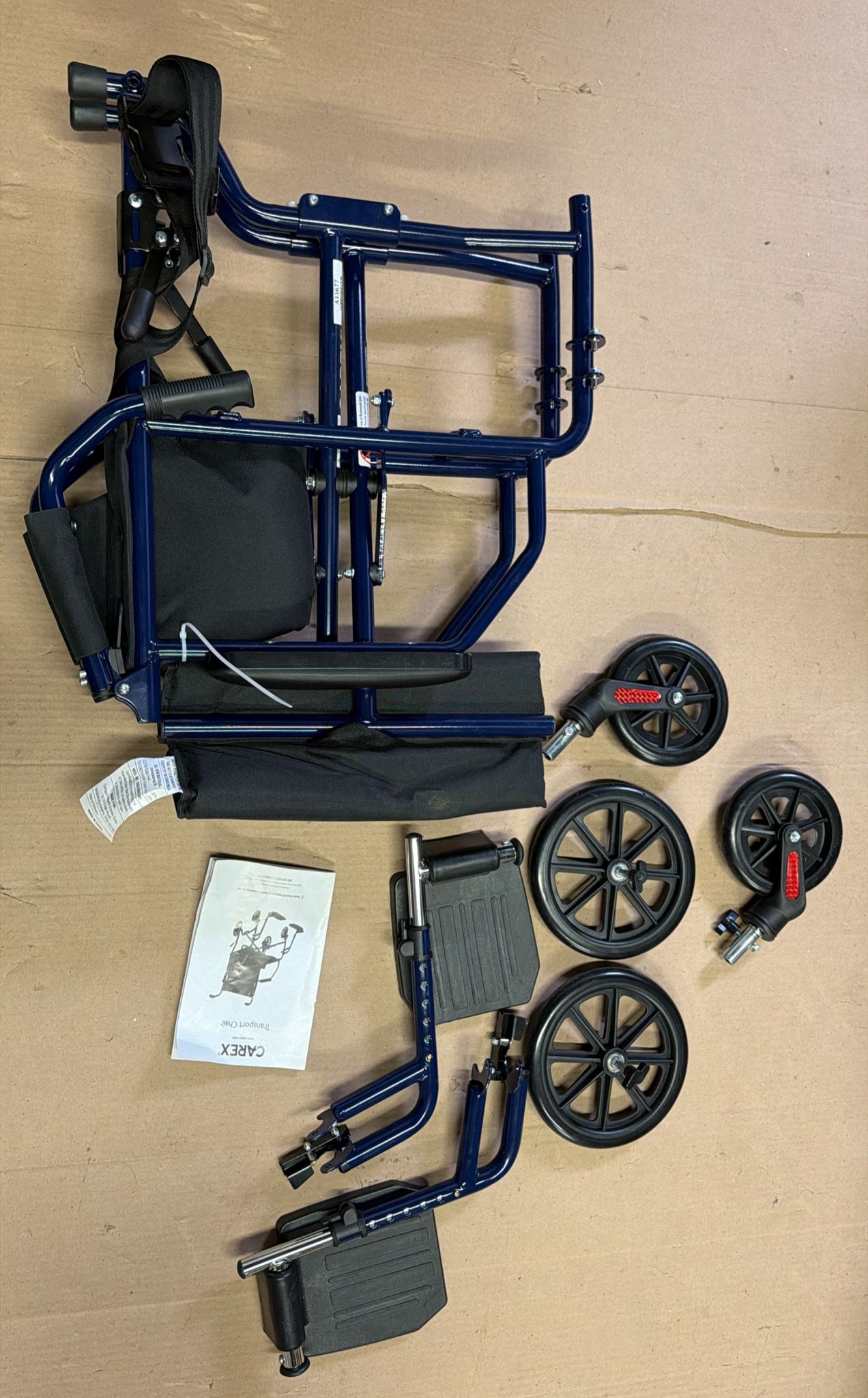 Carex transport wheelchair with padded armrests and swing-away footrest for comfortable mobility