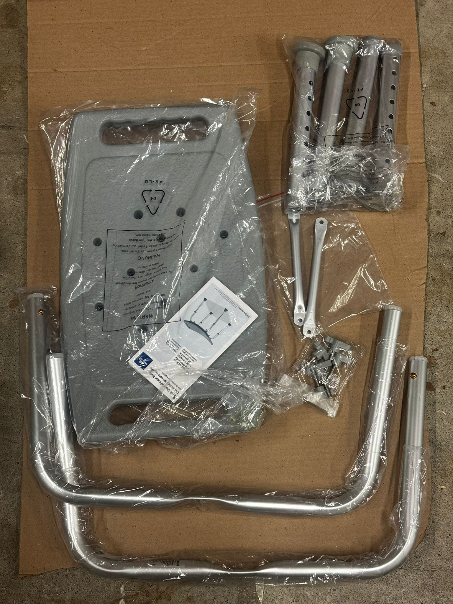 Medline aluminum bath benches providing sturdy bathroom support in grey