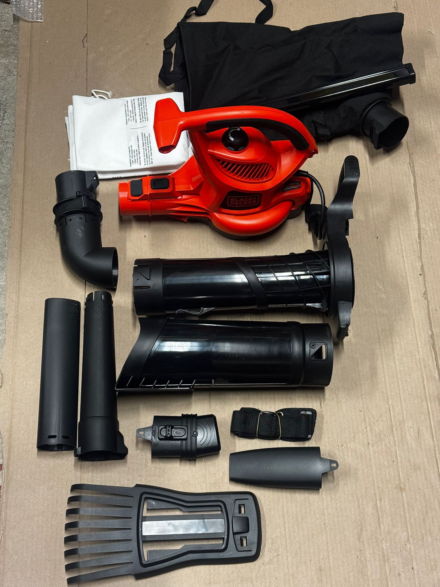 BLACK+DECKER electric leaf blower in black and orange for leaf vacuum and mulching