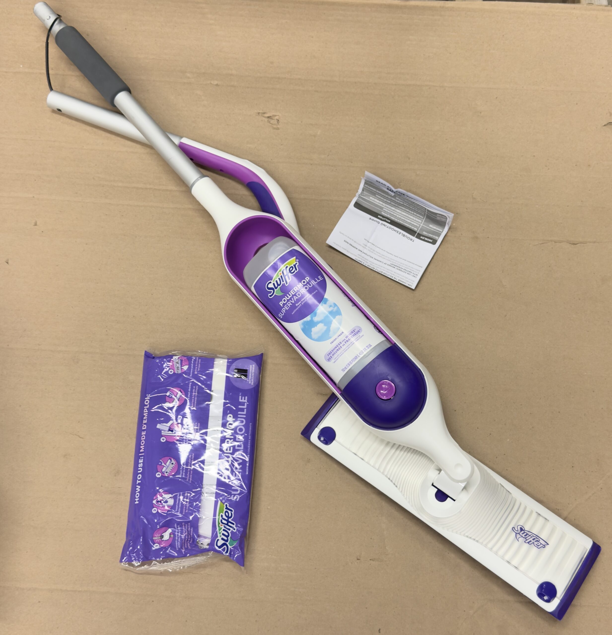 Swiffer multi surface mop kit in fresh scent with cleaning solution and pad refills